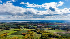 Blue sky and patchwork green fields of annapolis valley