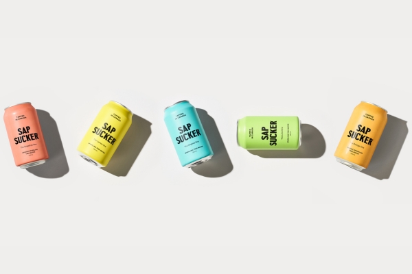 Sapsucker cans on grey background