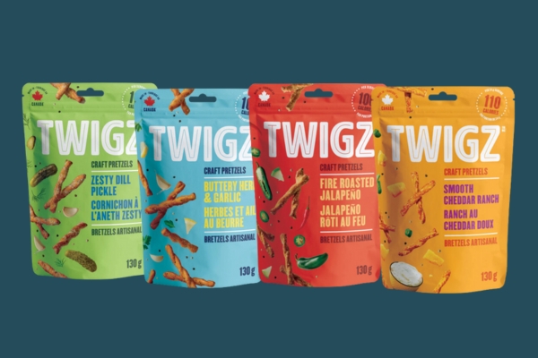 Packages of Twigz Pretzels on darke teal background