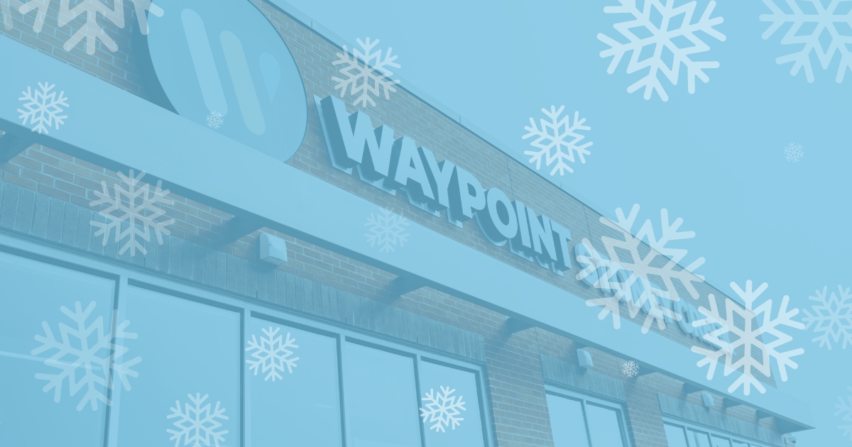 Image of the top half of a Waypoint location including signage. Image has a translucent blue colour wash and some snowflakes super imposed in the foreground.